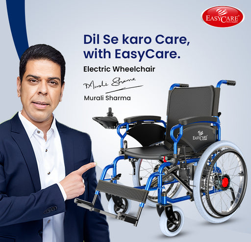 Electric wheelchair with EasyCare branding and a man pointing to it, featuring Murali Sharma's signature.