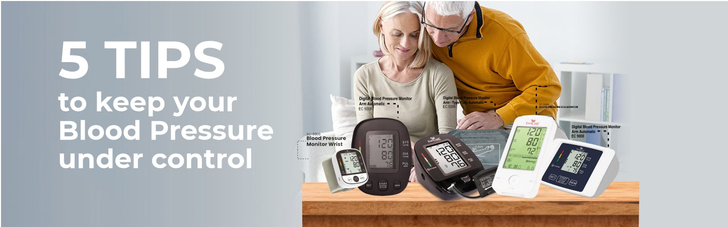 Old couple sitting with Easycare's Blood Pressure Monitors on Table