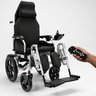 Electric wheelchair with remote control on a white background