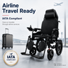 Electric wheelchair with IATA compliant badge on a background of an airport terminal.