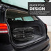 Easy-to-fold design of EasyCare commode wheelchair for quick storage and transport, demonstrated by the wheelchair folded and stored in the back of a car for convenience. Ideal for mobility and travel-friendly use.